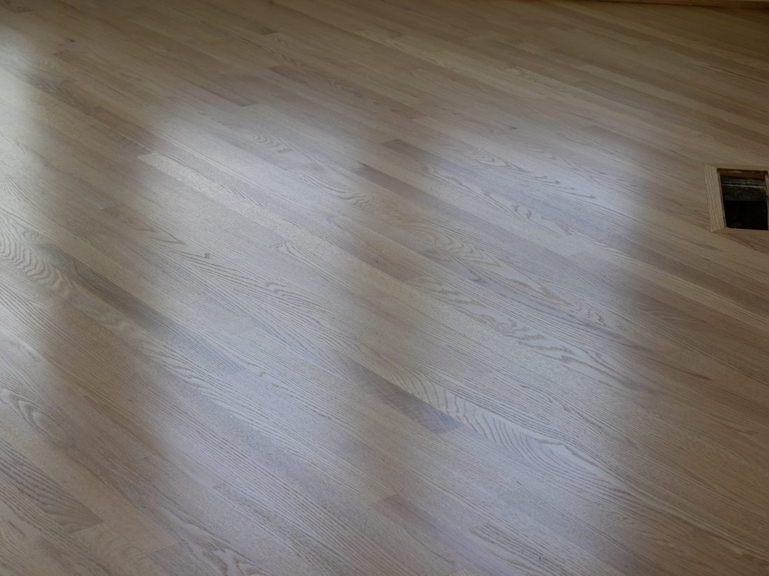 Natural white oak floor showing fine, even grain