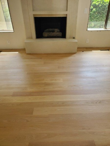 5-inch plain-sawn white oak installation near a fireplace